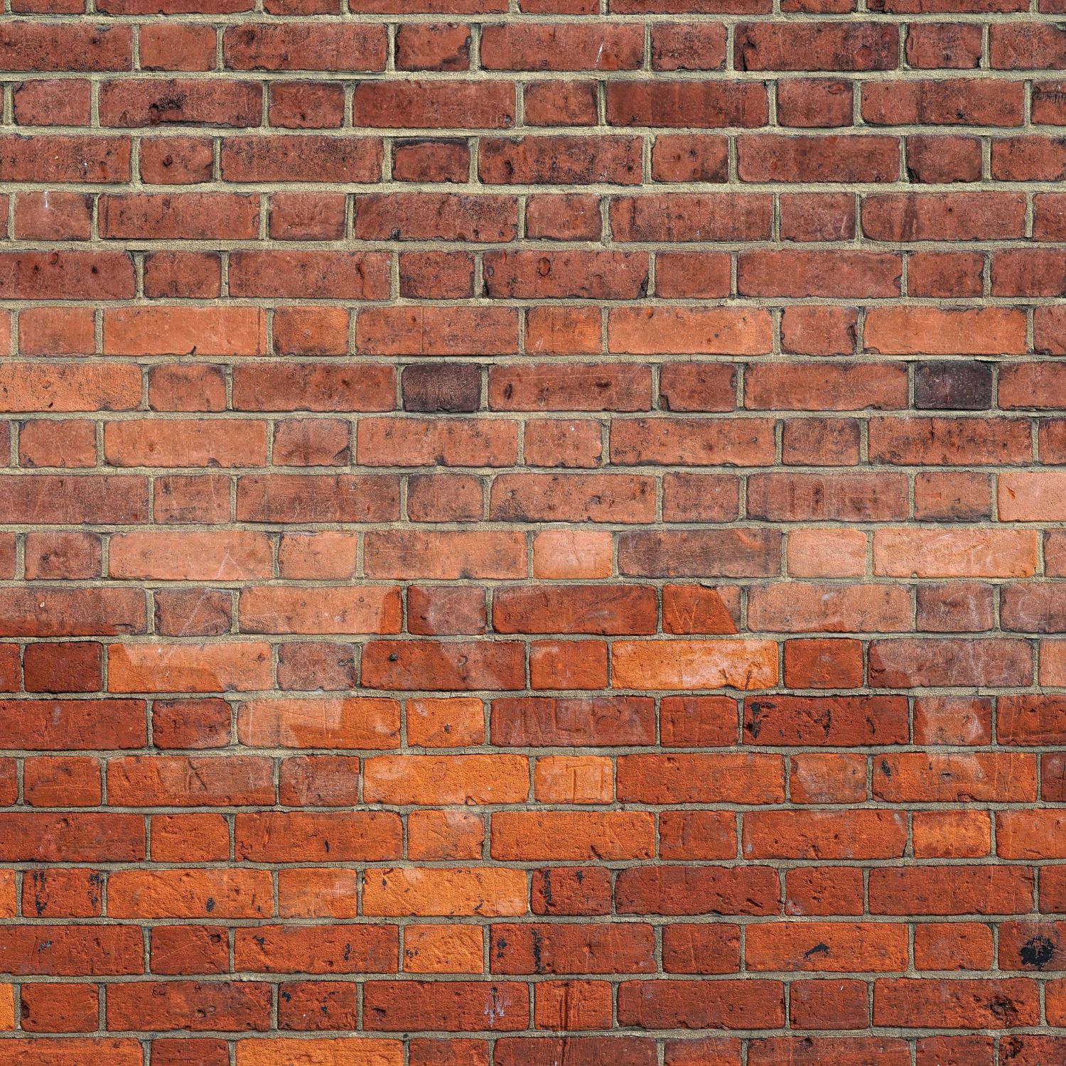 Imagem de uma parede decorada com papel de parede 3D que imita tijolinhos, 